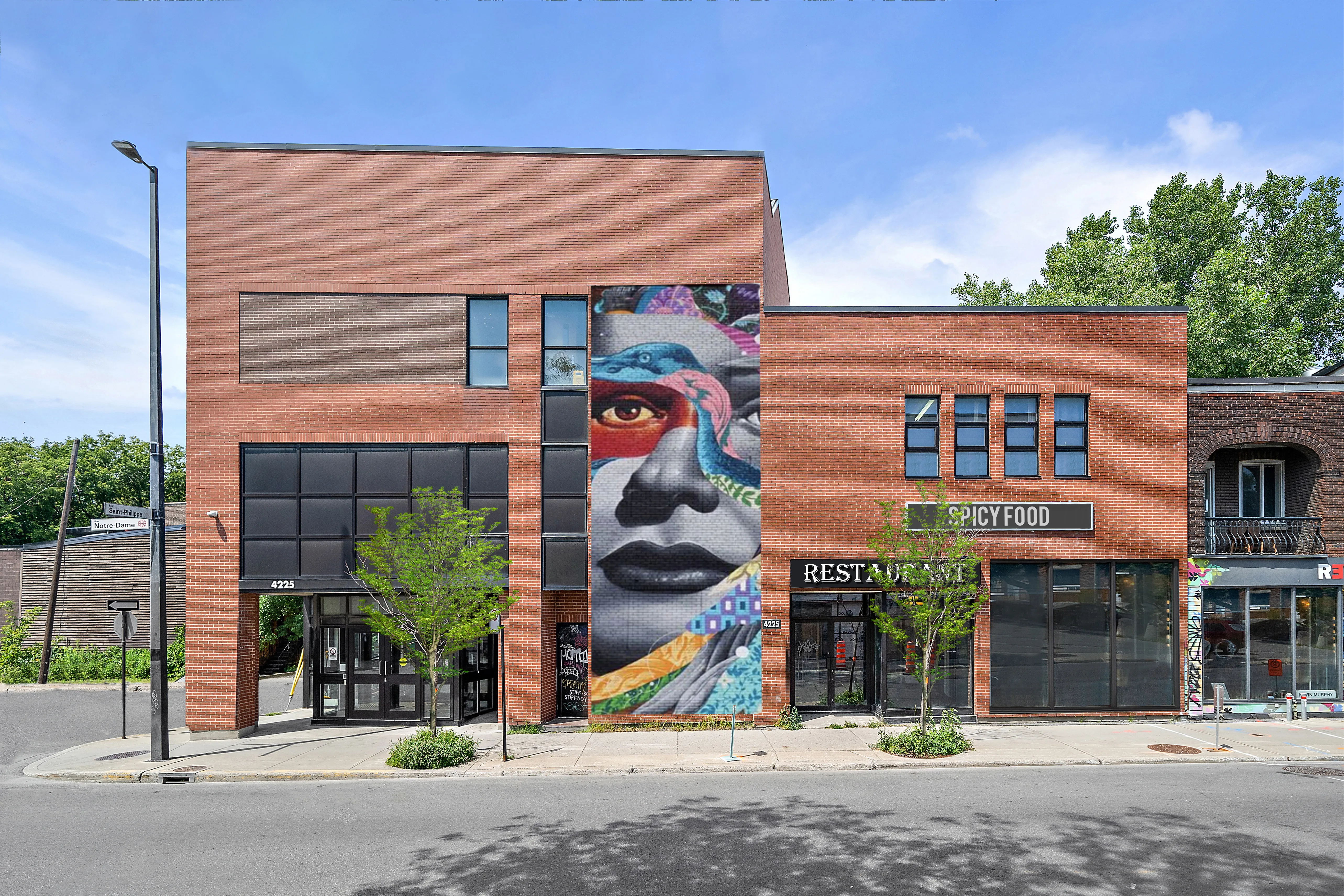 Brick frontage with a large mural