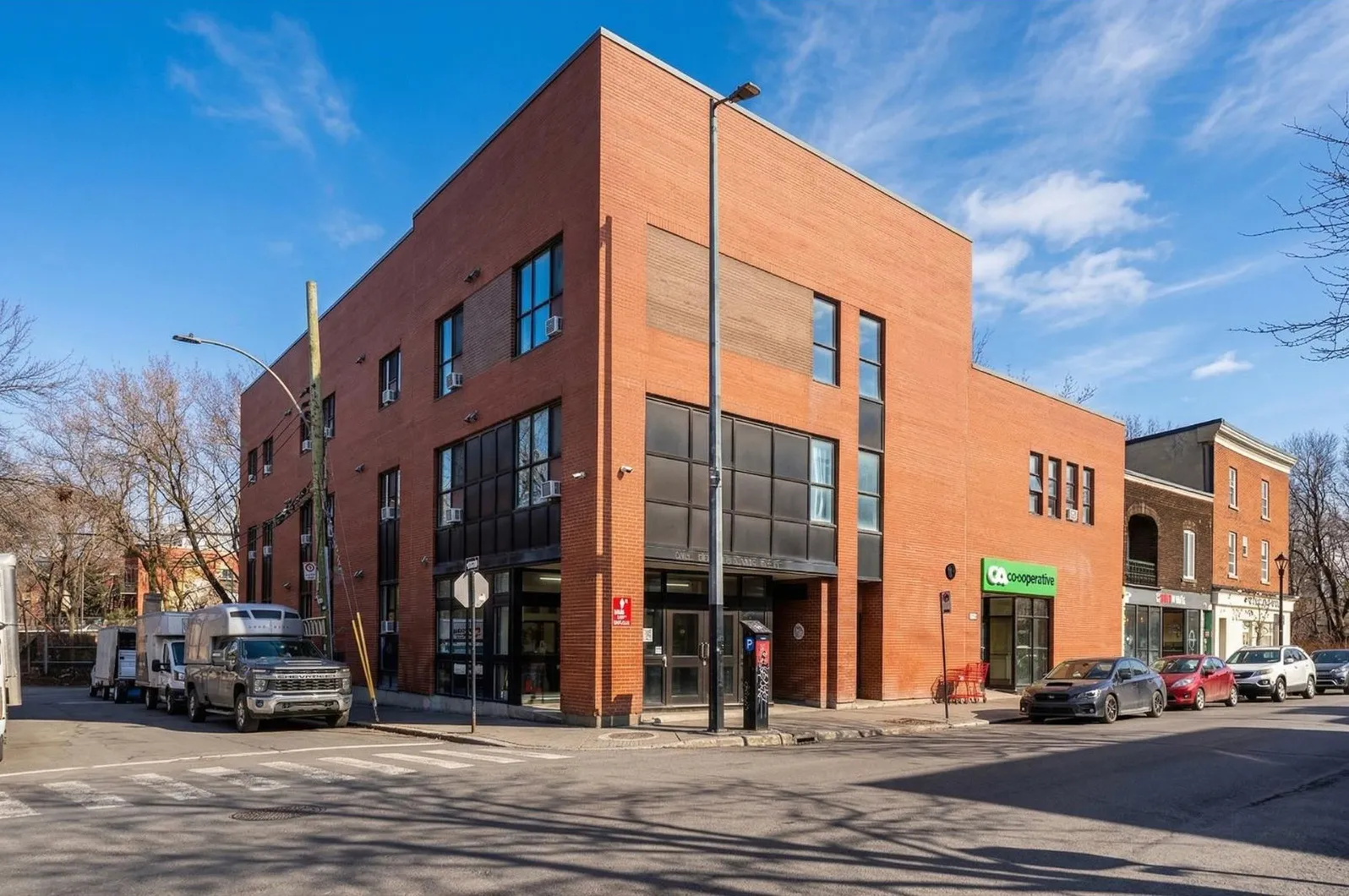 4225 Notre-Dame Ouest on its corner in Saint-Henri, with retail at grade