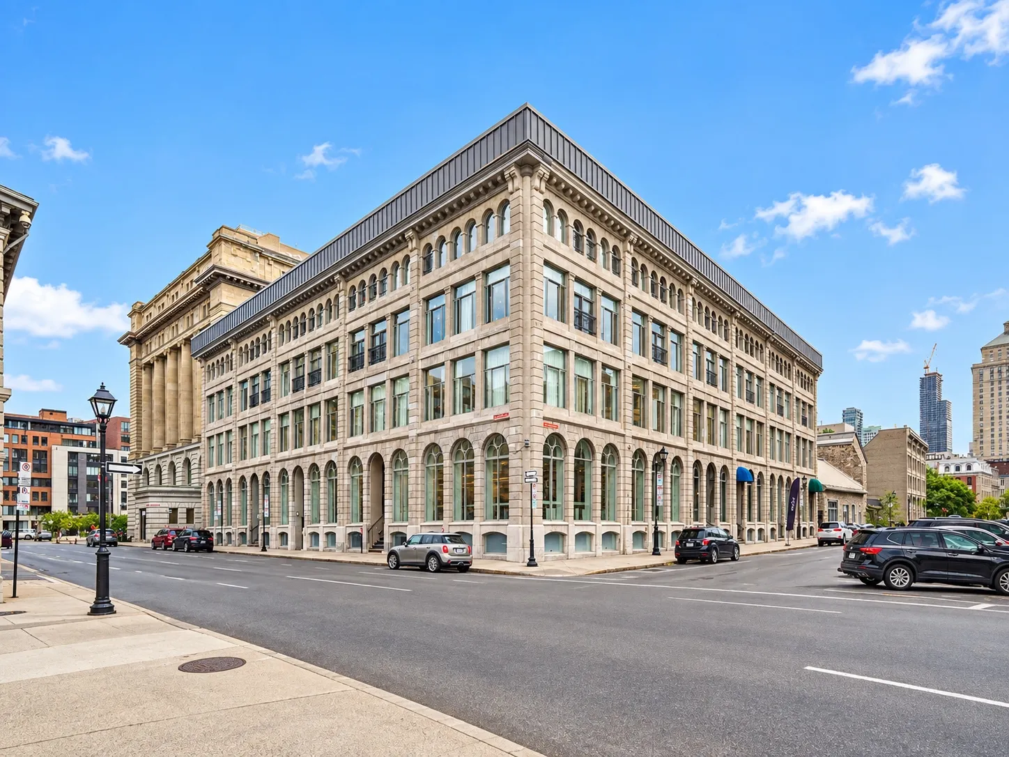 Les Cours Saint-Pierre: the stone-and-cast-iron corner elevation at 105 rue Normand, Old Montreal